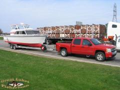 boat_on_trailer_with_truck.jpg